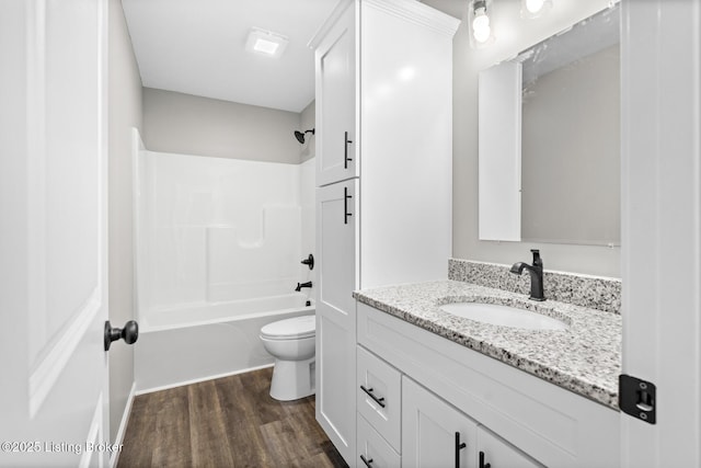 3408 Rhodelia Rd, Payneville, KY 40157 - full bathroom with wood finished floors, vanity, and bathtub / shower combination