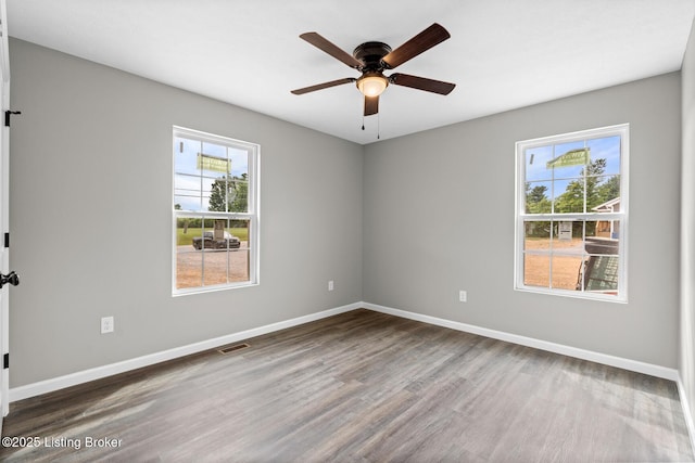 3408 Rhodelia Rd, Payneville, KY 40157 - empty room with wood finished floors and ceiling fan