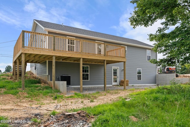 3408 Rhodelia Rd, Payneville, KY 40157 - back of property with a wooden deck and a shingled roof