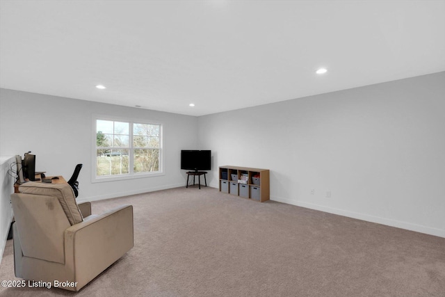 sitting room with recessed lighting, carpet, and baseboards