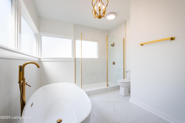 full bathroom with baseboards, toilet, a soaking tub, a marble finish shower, and marble finish floor