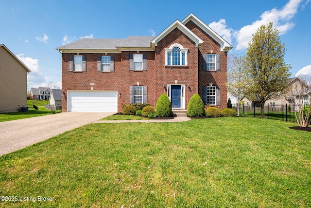 colonial inspired home with a garage, fence, a front lawn, brick siding, and concrete driveway