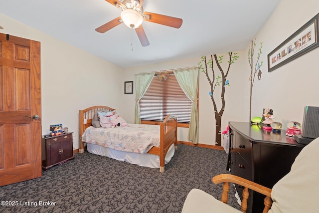 351 Serenity Cove Ln, Mammoth Cave, KY 42259 - bedroom featuring dark colored carpet, baseboards, and ceiling fan