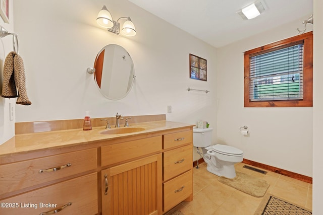 351 Serenity Cove Ln, Mammoth Cave, KY 42259 - bathroom with vanity, baseboards, tile patterned flooring, toilet, and visible vents