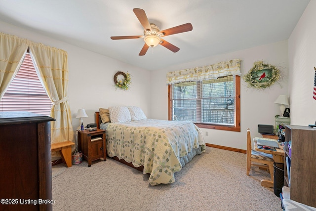 351 Serenity Cove Ln, Mammoth Cave, KY 42259 - bedroom with light carpet, ceiling fan, and baseboards