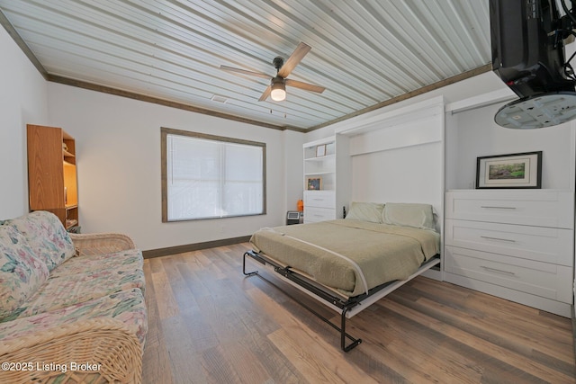351 Serenity Cove Ln, Mammoth Cave, KY 42259 - bedroom featuring ceiling fan, ornamental molding, wood ceiling, wood finished floors, and baseboards