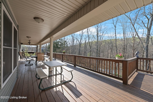 351 Serenity Cove Ln, Mammoth Cave, KY 42259 - wooden terrace featuring a forest view and outdoor dining area
