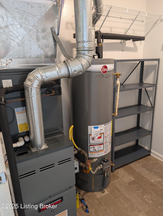 utility room with water heater