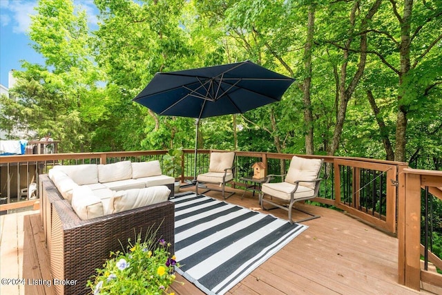 wooden deck with an outdoor hangout area