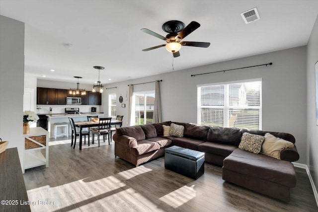 109 Kentucky Oaks Trl, Elizabethtown, KY 42701 - living room featuring recessed lighting, visible vents, ceiling fan with notable chandelier, and wood finished floors