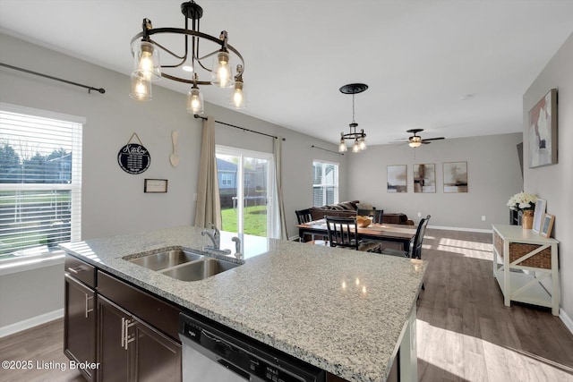 109 Kentucky Oaks Trl, Elizabethtown, KY 42701 - kitchen with pendant lighting, dark wood finished floors, dishwasher, a sink, and baseboards
