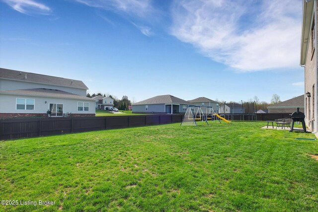 109 Kentucky Oaks Trl, Elizabethtown, KY 42701 - view of yard with a residential view, a fenced backyard, and a playground