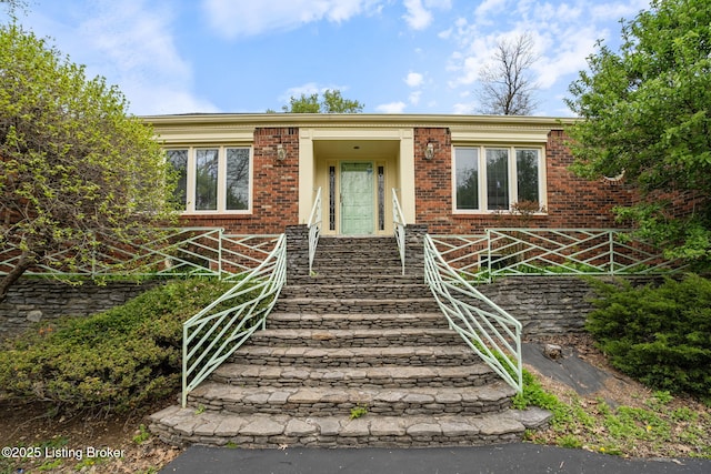view of front of property with brick siding