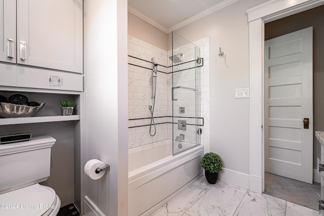 bathroom featuring baseboards, toilet,  shower combination, crown molding, and marble finish floor