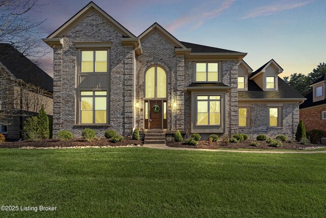 14801 Forest Oaks Dr, Louisville, KY 40245 - view of front of home featuring brick siding and a front lawn