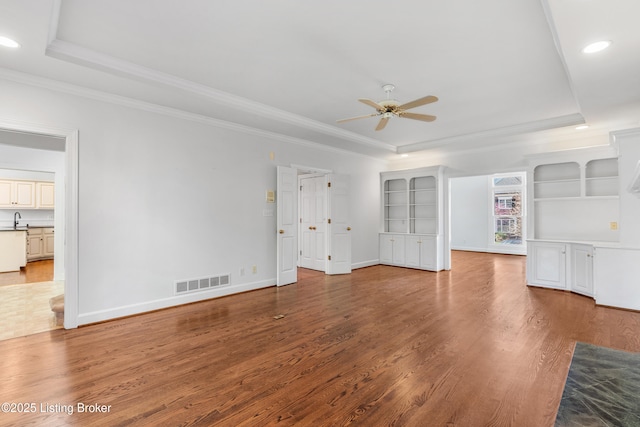 14801 Forest Oaks Dr, Louisville, KY 40245 - unfurnished living room with a raised ceiling, crown molding, and a ceiling fan