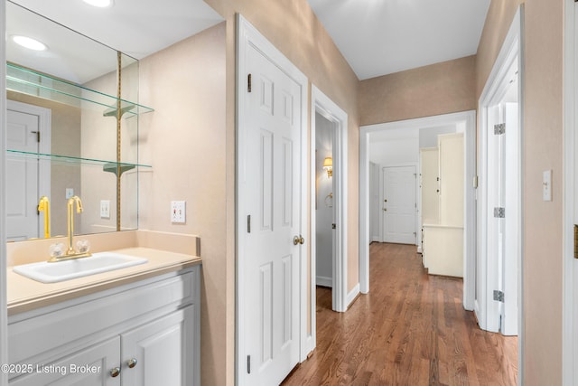 14801 Forest Oaks Dr, Louisville, KY 40245 - interior space with vanity, baseboards, and wood finished floors