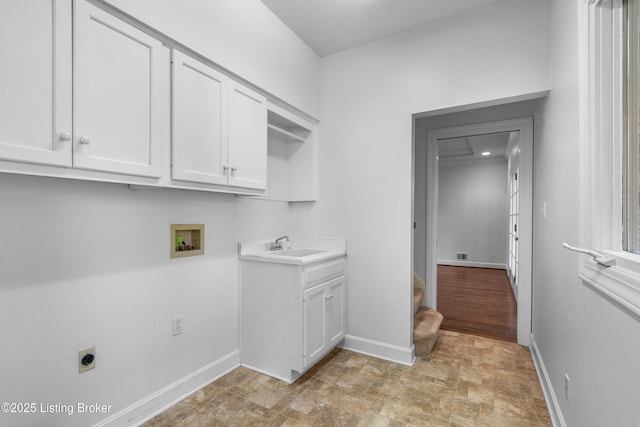 14801 Forest Oaks Dr, Louisville, KY 40245 - laundry area featuring baseboards, washer hookup, a sink, hookup for an electric dryer, and cabinet space