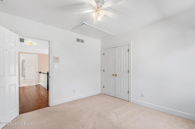 14801 Forest Oaks Dr, Louisville, KY 40245 - unfurnished bedroom with attic access, baseboards, and visible vents