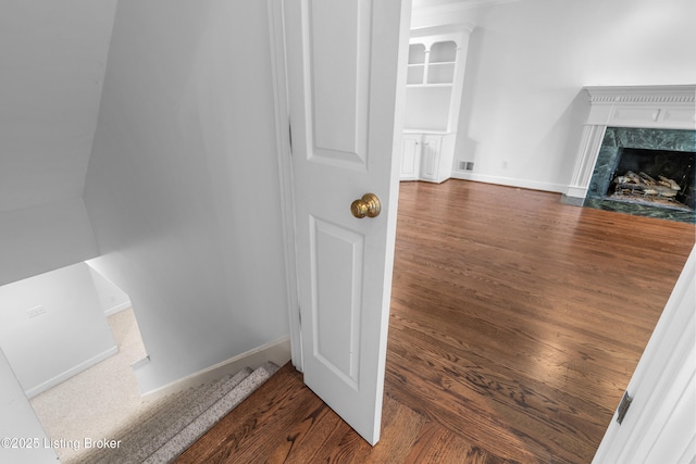 14801 Forest Oaks Dr, Louisville, KY 40245 - room details with a high end fireplace, baseboards, and wood finished floors