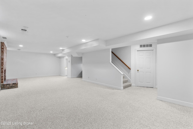 14801 Forest Oaks Dr, Louisville, KY 40245 - finished basement with visible vents, baseboards, recessed lighting, and light colored carpet
