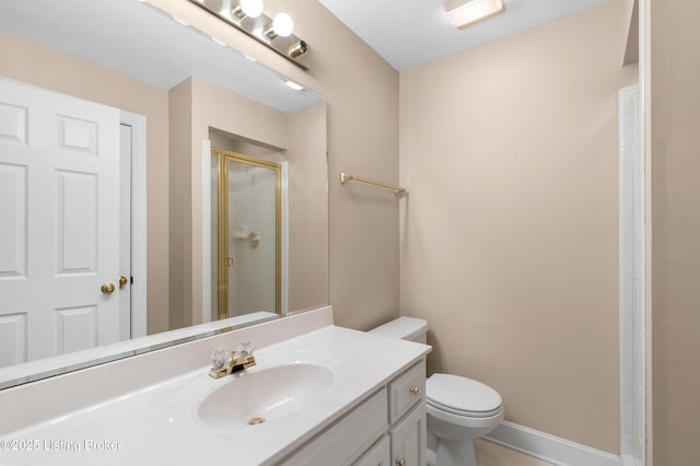 14801 Forest Oaks Dr, Louisville, KY 40245 - bathroom with toilet, a shower stall, vanity, and baseboards