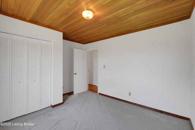 7700 Organ Creek Rd, Pendleton, KY 40055 - unfurnished bedroom featuring wood ceiling, a closet, carpet floors, and baseboards