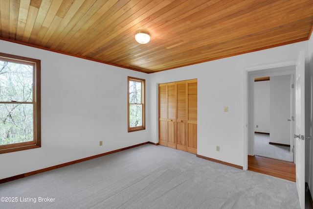 7700 Organ Creek Rd, Pendleton, KY 40055 - unfurnished bedroom featuring multiple windows, wooden ceiling, and carpet