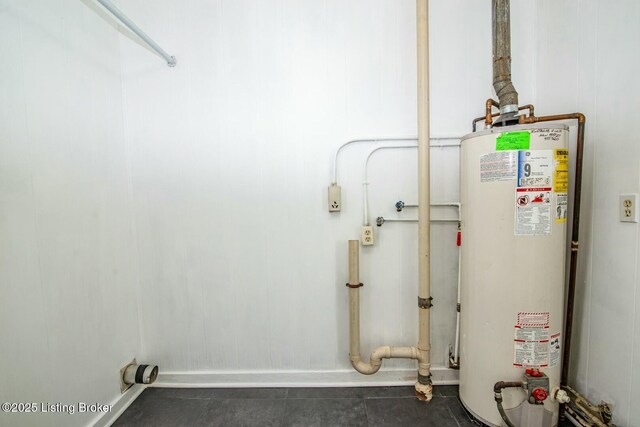 utility room featuring gas water heater