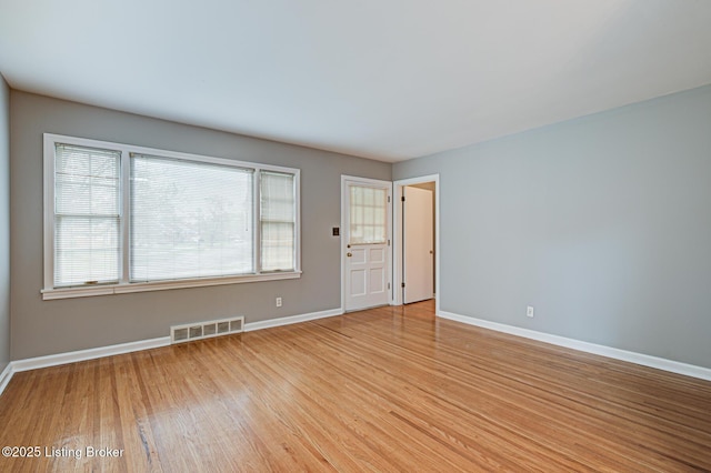 3014 Nadina Dr, Louisville, KY 40220 - unfurnished room with visible vents, baseboards, and light wood-type flooring