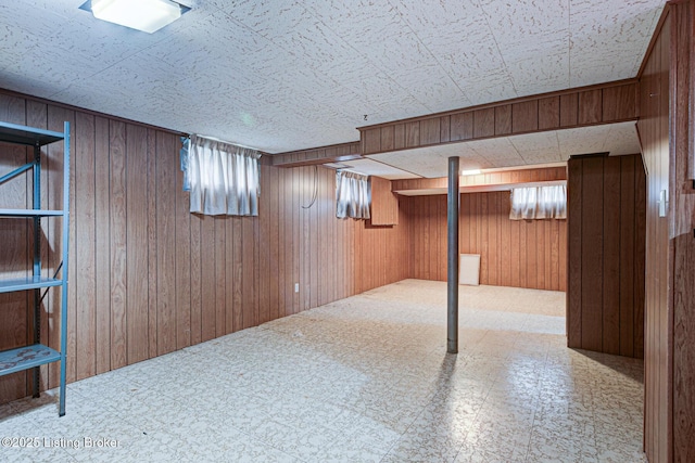 3014 Nadina Dr, Louisville, KY 40220 - basement featuring tile patterned floors and wood walls