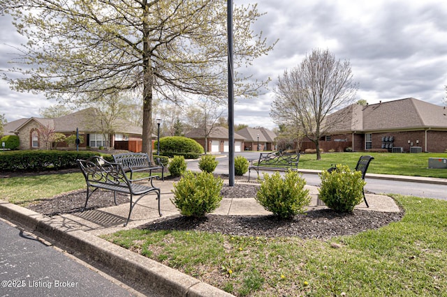 surrounding community with a lawn
