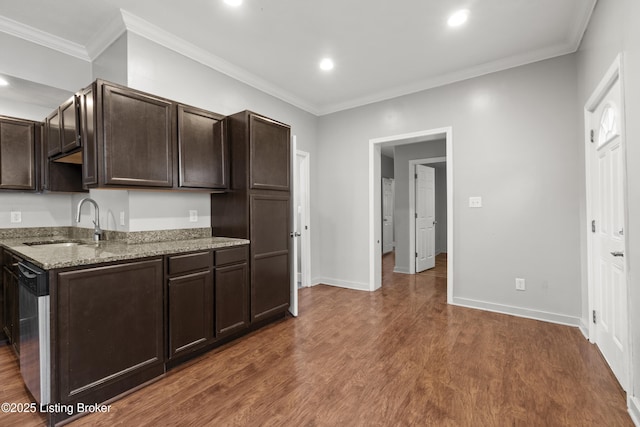 kitchen featuring recessed lighting, light stone countertops, dark wood-type flooring, and dark brown cabinets