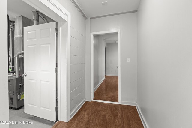 hall featuring wood finished floors