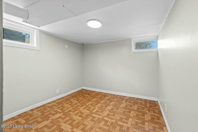 below grade area featuring baseboards
