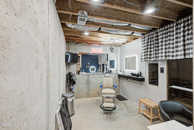 interior space with concrete flooring