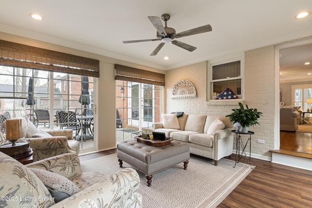 living room featuring crown molding, recessed lighting, a ceiling fan, and wood finished floors