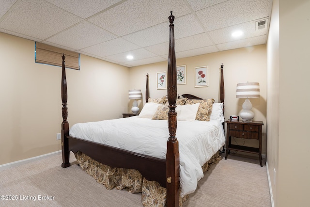bedroom featuring visible vents, baseboards, a paneled ceiling, recessed lighting, and carpet flooring