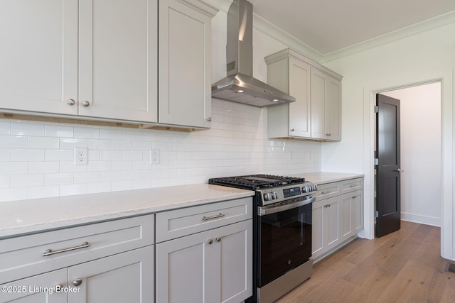 3238 Catalpa Farms Dr, Fisherville, KY 40023 - kitchen with wall chimney range hood, stainless steel gas range, ornamental molding, light wood finished floors, and backsplash