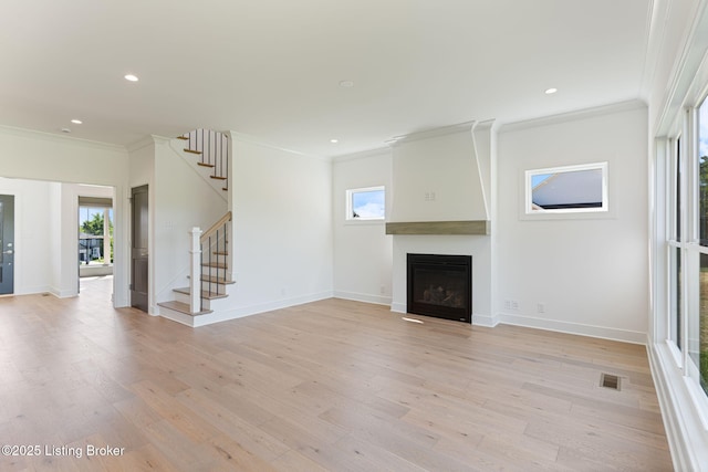 3238 Catalpa Farms Dr, Fisherville, KY 40023 - unfurnished living room featuring ornamental molding, stairs, a fireplace, light wood-style flooring, and baseboards
