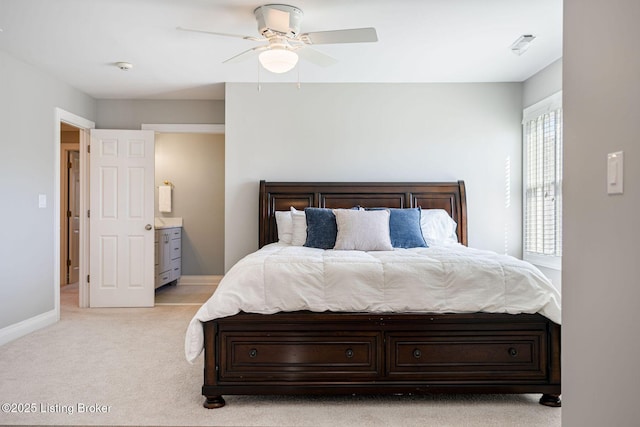 bedroom with a ceiling fan, baseboards, and light colored carpet