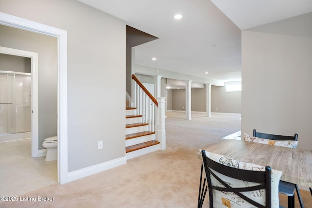 interior space with recessed lighting, baseboards, and light colored carpet