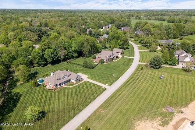 bird's eye view with a forest view