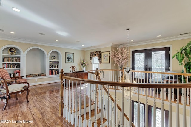 320 Longview Park Pl, Louisville, KY 40245 - hall with wood finished floors, recessed lighting, crown molding, built in shelves, and french doors