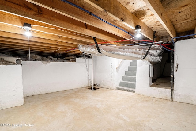 unfinished basement with stairs