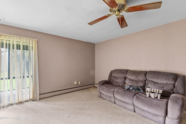 living area featuring carpet floors, a ceiling fan, and baseboard heating