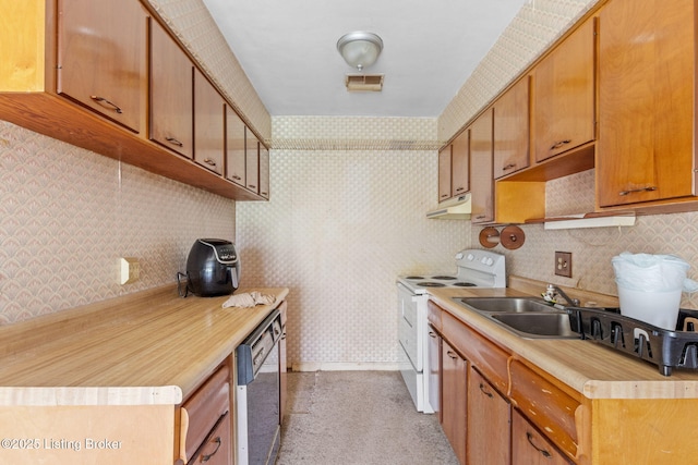 kitchen featuring under cabinet range hood, visible vents, white electric range oven, dishwashing machine, and a sink