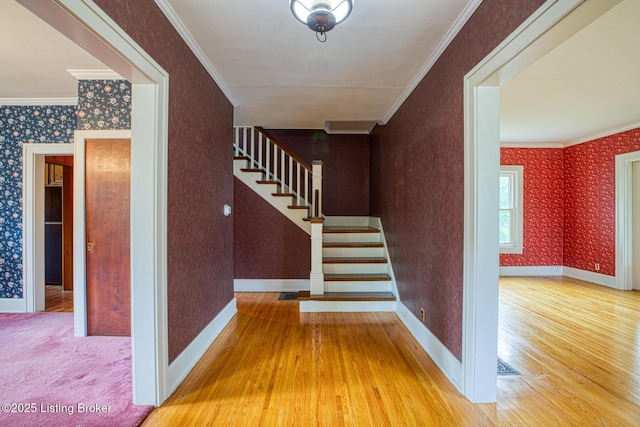 325 Wood Rd, Lyndon, KY 40222 - stairs with crown molding, wood finished floors, baseboards, and wallpapered walls