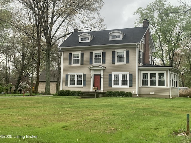 325 Wood Rd, Lyndon, KY 40222 - view of front of property featuring a chimney and a front lawn