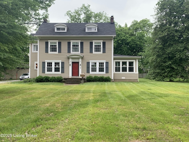 325 Wood Rd, Lyndon, KY 40222 - view of front of home with a front yard and a chimney